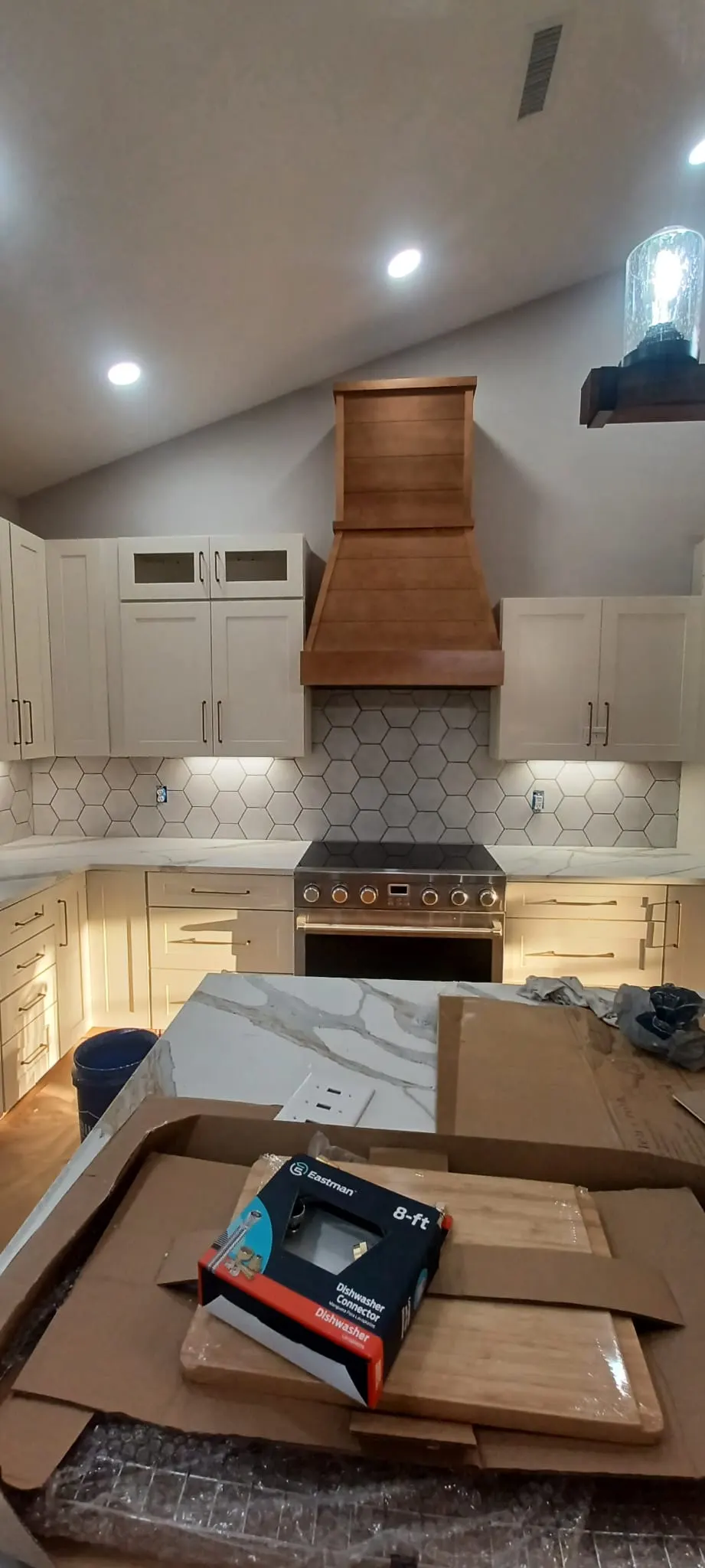 Kitchen remodel with hexagon tile backsplash and marble countertop, Kings Mountain Tile project in North Carolina